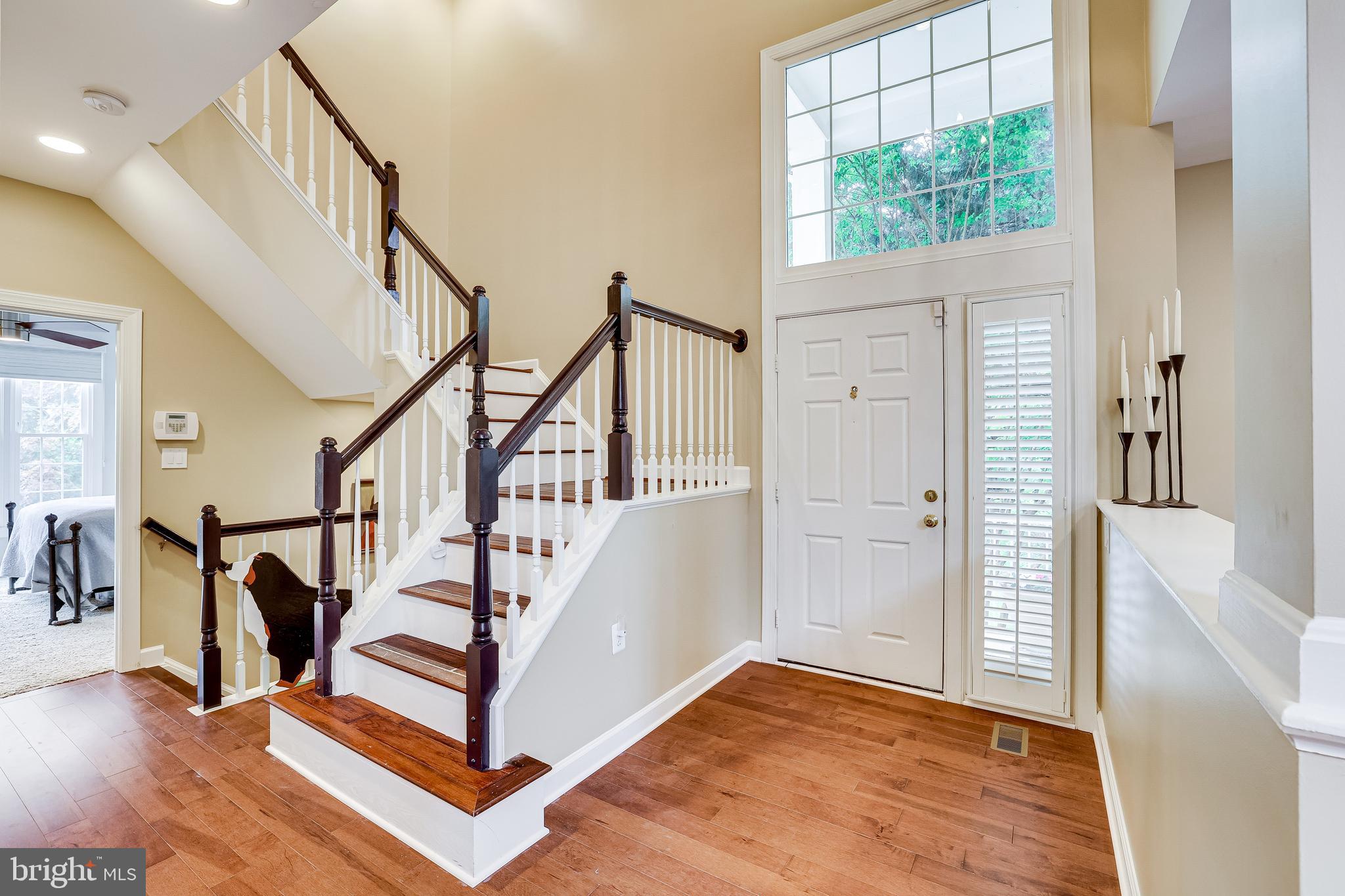 1369 Park Garden Lane Reston, VA 20194 - Photo 5 of 46 Hardwood stairs throughout