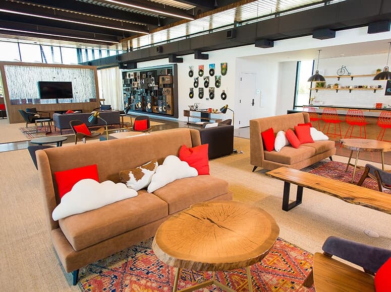 9000 The Ravine Way Austin, TX 78744 - Photo 12 of 17 Community lobby featuring a high ceiling