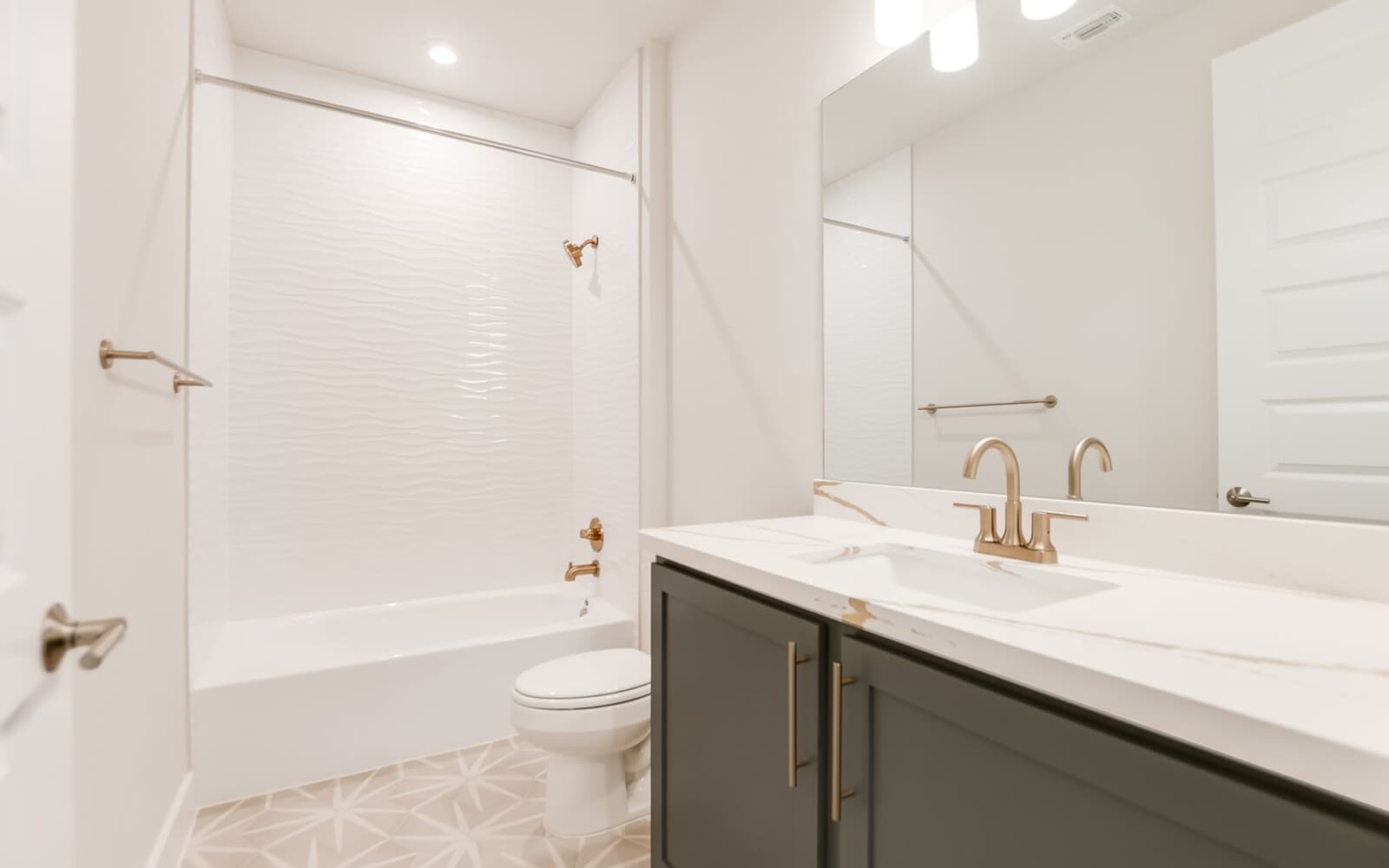 9000 The Ravine Way Austin, TX 78744 - Photo 7 of 17 Full bath featuring vanity and shower / washtub combination