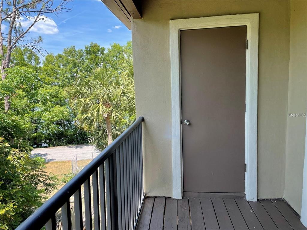 199 Afton Square, Unit 309 Altamonte Springs, FL 32714 - Photo 3 of 17 a view of balcony with wooden floor