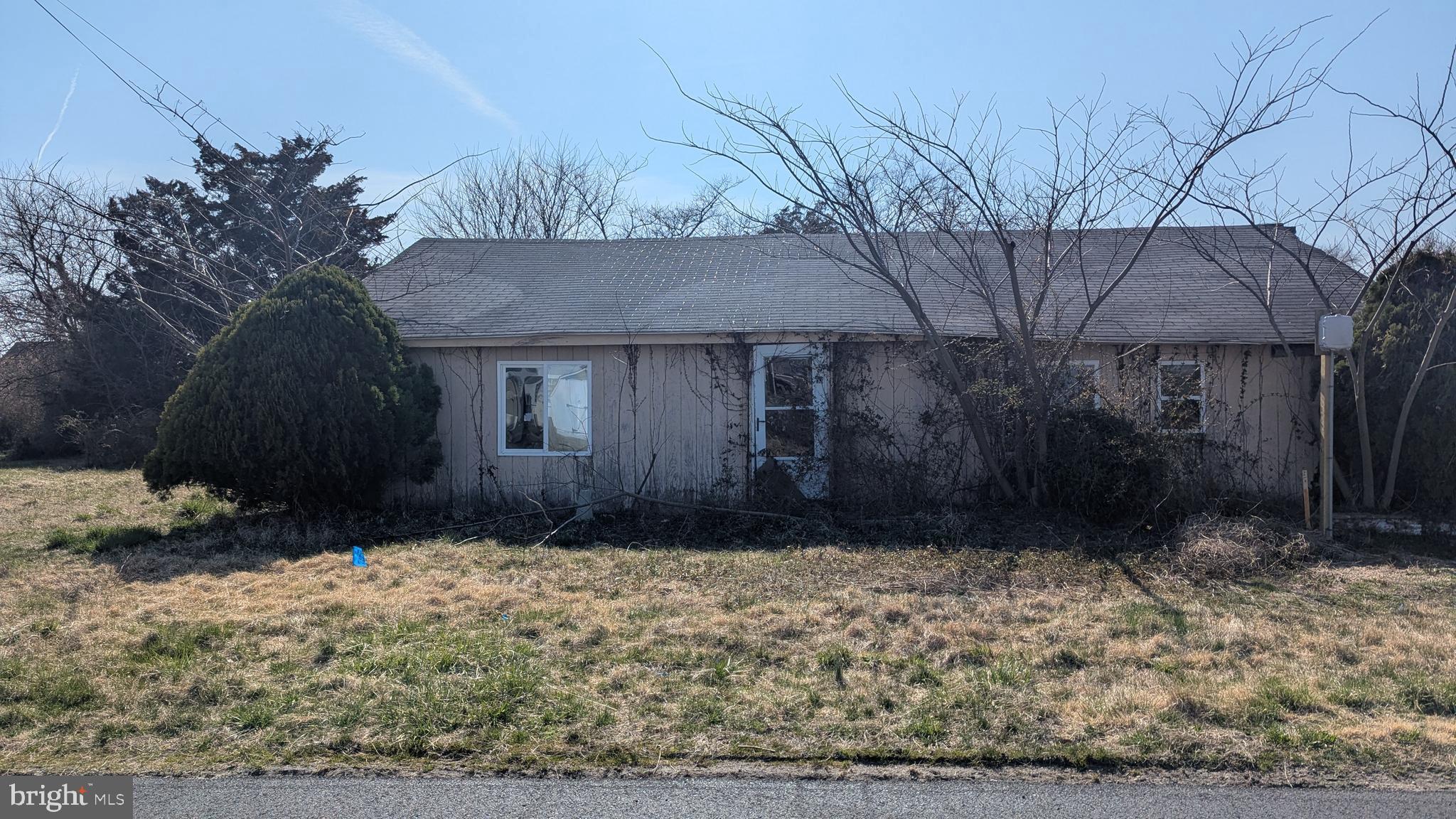 53 Creek Avenue Fortescue, NJ 08321 - Photo 1 of 11 a front view of a house with a yard