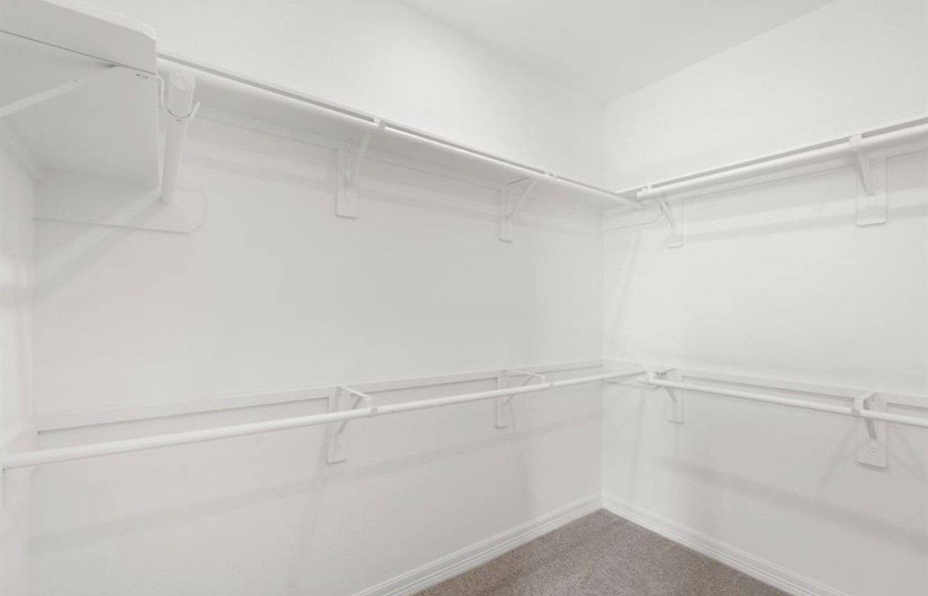 2912 Cliff Ridge Lane Katy, TX 77493 - Photo 14 of 36 a view of an empty walk in closet