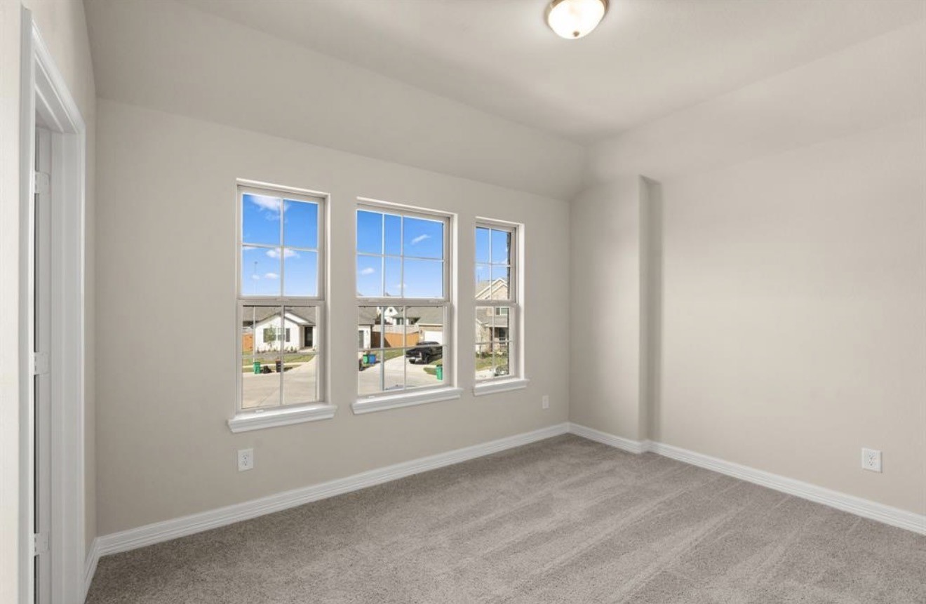 2912 Cliff Ridge Lane Katy, TX 77493 - Photo 16 of 36 an empty room with windows and closet