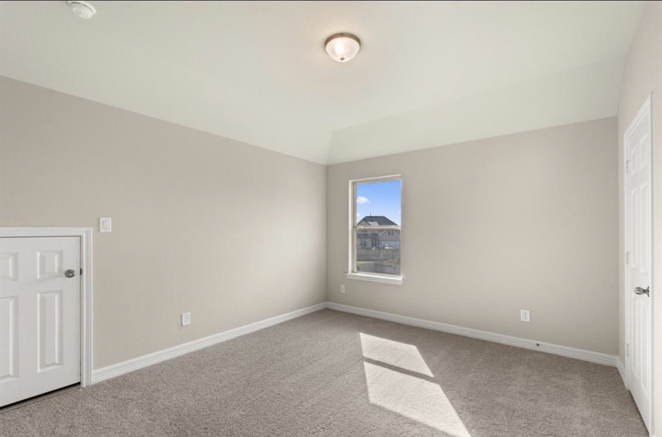 2912 Cliff Ridge Lane Katy, TX 77493 - Photo 20 of 36 an empty room with windows