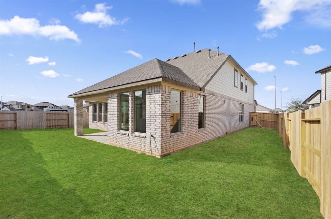 2912 Cliff Ridge Lane Katy, TX 77493 - Photo 23 of 36 a view of a house with backyard