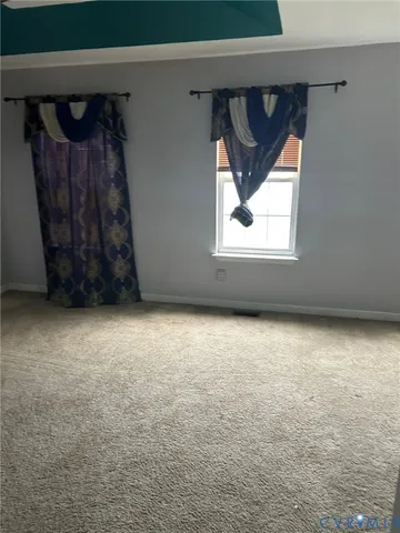 a view of a room with a window