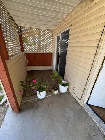 a view of street with parked cars