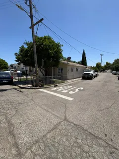 a view of street from balcony