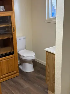 a bathroom with a toilet and a sink