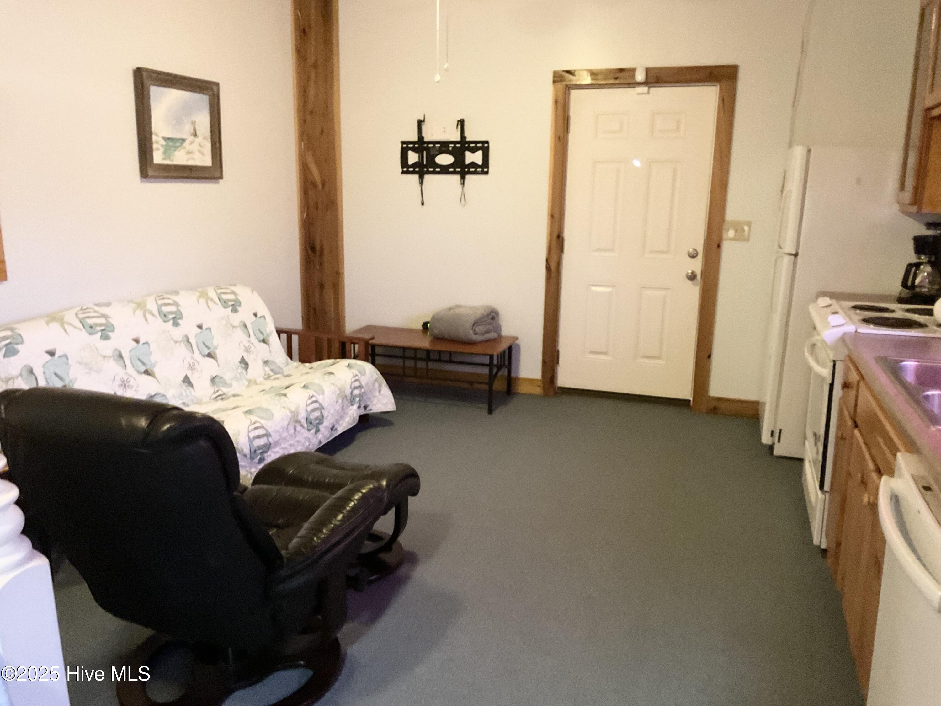 126 Northeast 75th Street, Unit BACK Oak Island, NC 28465 - Photo 5 of 10 IMG_0025