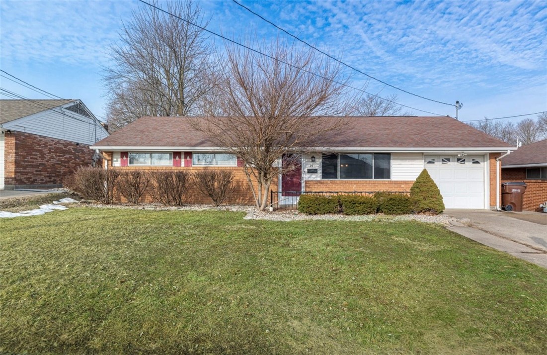 10 Monroe Road Lebanon, OH 45036 - Photo 1 of 14 This charming residence features classic brick detailing and a convenient attached garage.