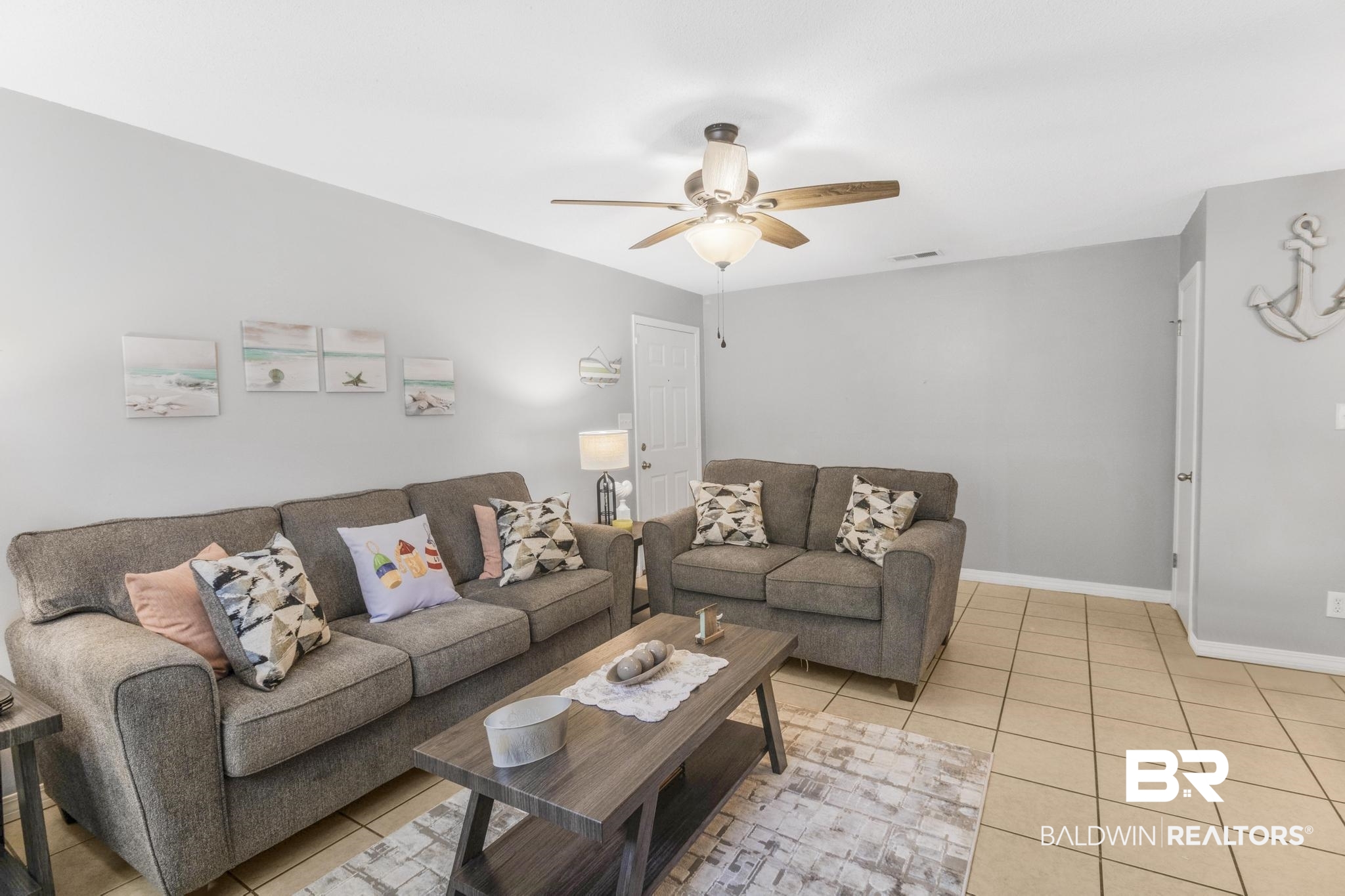 110 5th Street, Unit A 103 Daphne, AL 36526 - Photo 10 of 28 Tiled living room featuring ceiling fan