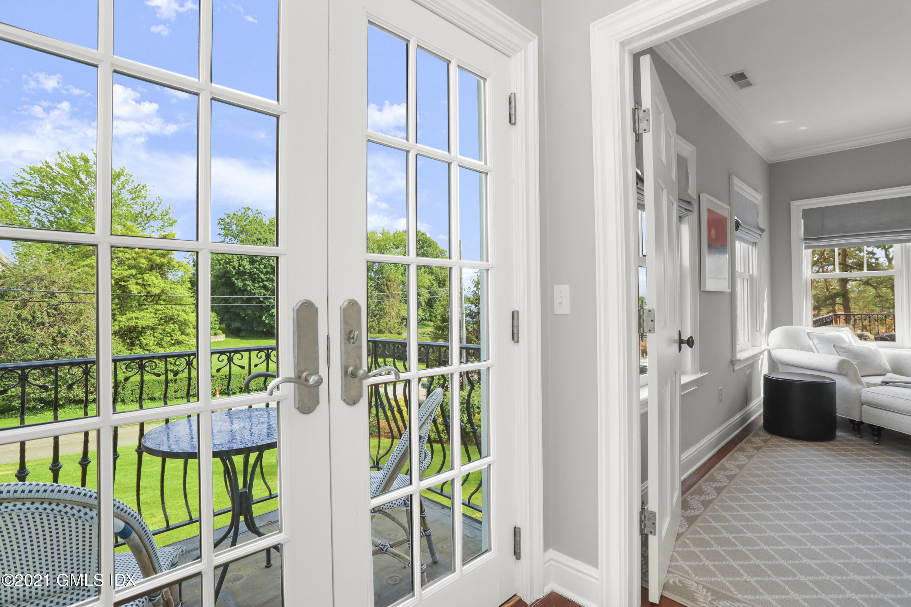 74 Cedar Cliff Road Riverside, CT 06878 - Photo 30 of 66 a view of an entryway with wooden floor and windows
