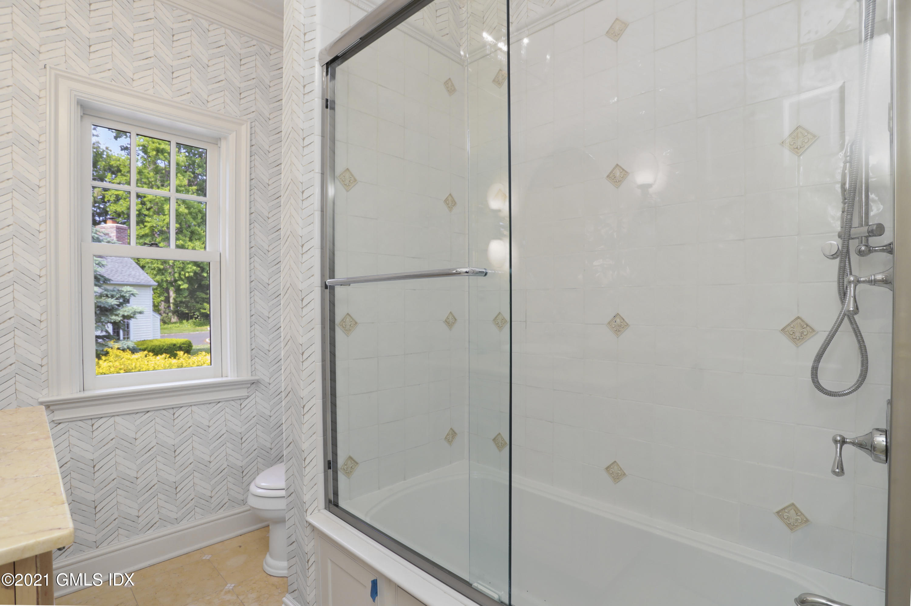 74 Cedar Cliff Road Riverside, CT 06878 - Photo 34 of 66 a bathroom with a granite countertop bathtub shower and toilet