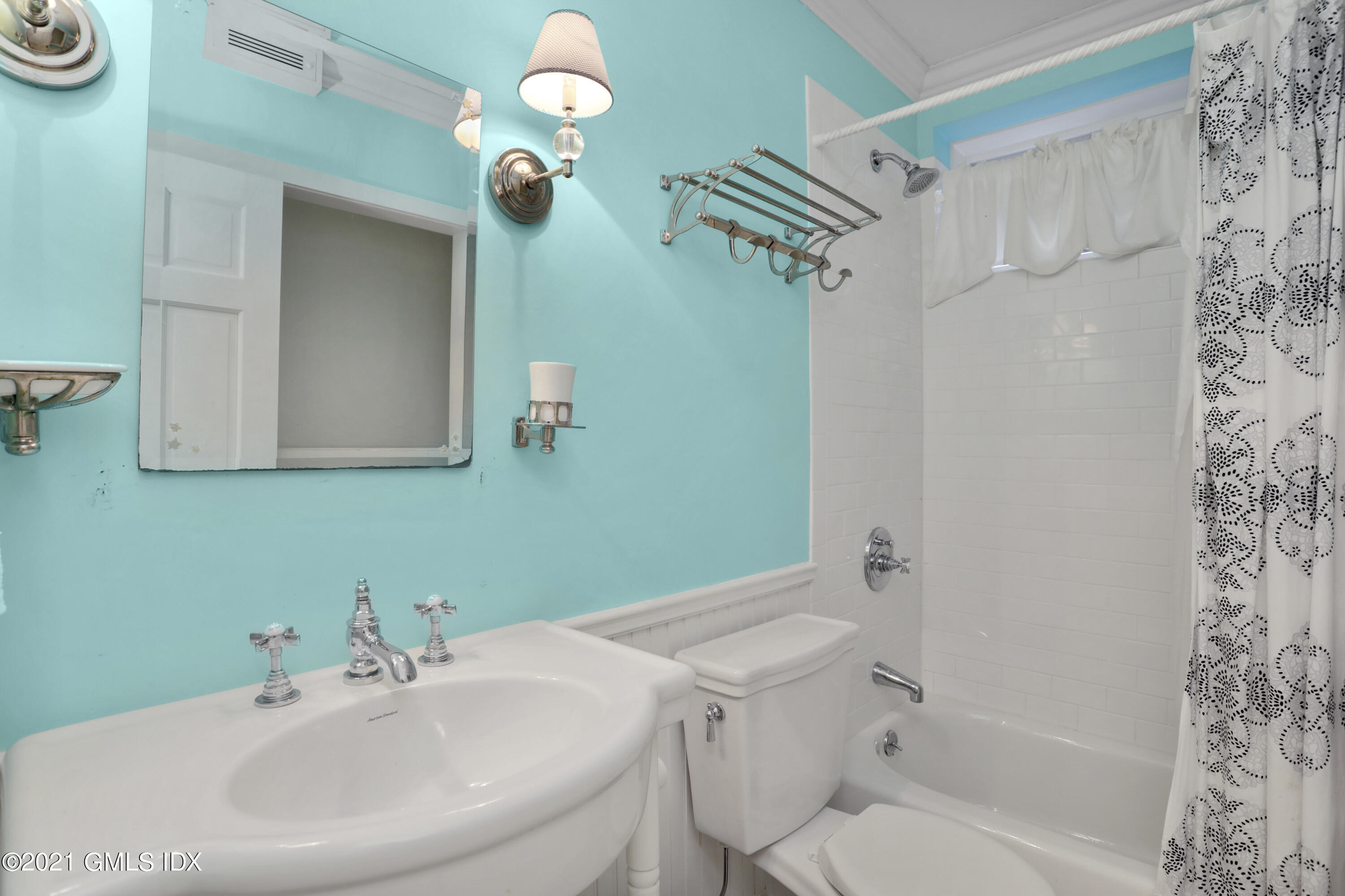 74 Cedar Cliff Road Riverside, CT 06878 - Photo 47 of 66 a bathroom with a sink a toilet and shower