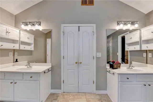 a view of a livingroom with a ceiling fan and window