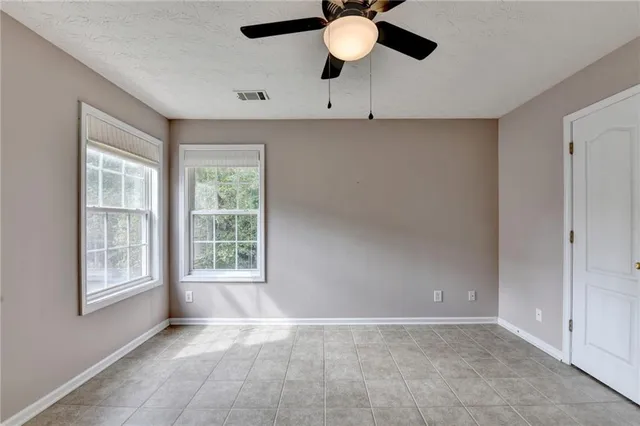 a kitchen with a stove and a microwave