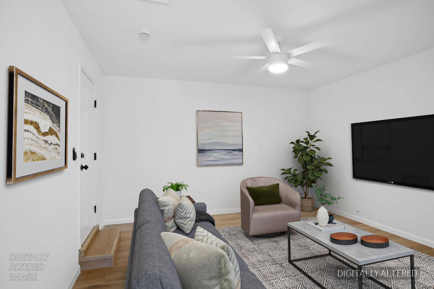 1451 Kent Way Modesto, CA 95355 - Photo 27 of 37 a living room with furniture and a flat screen tv
