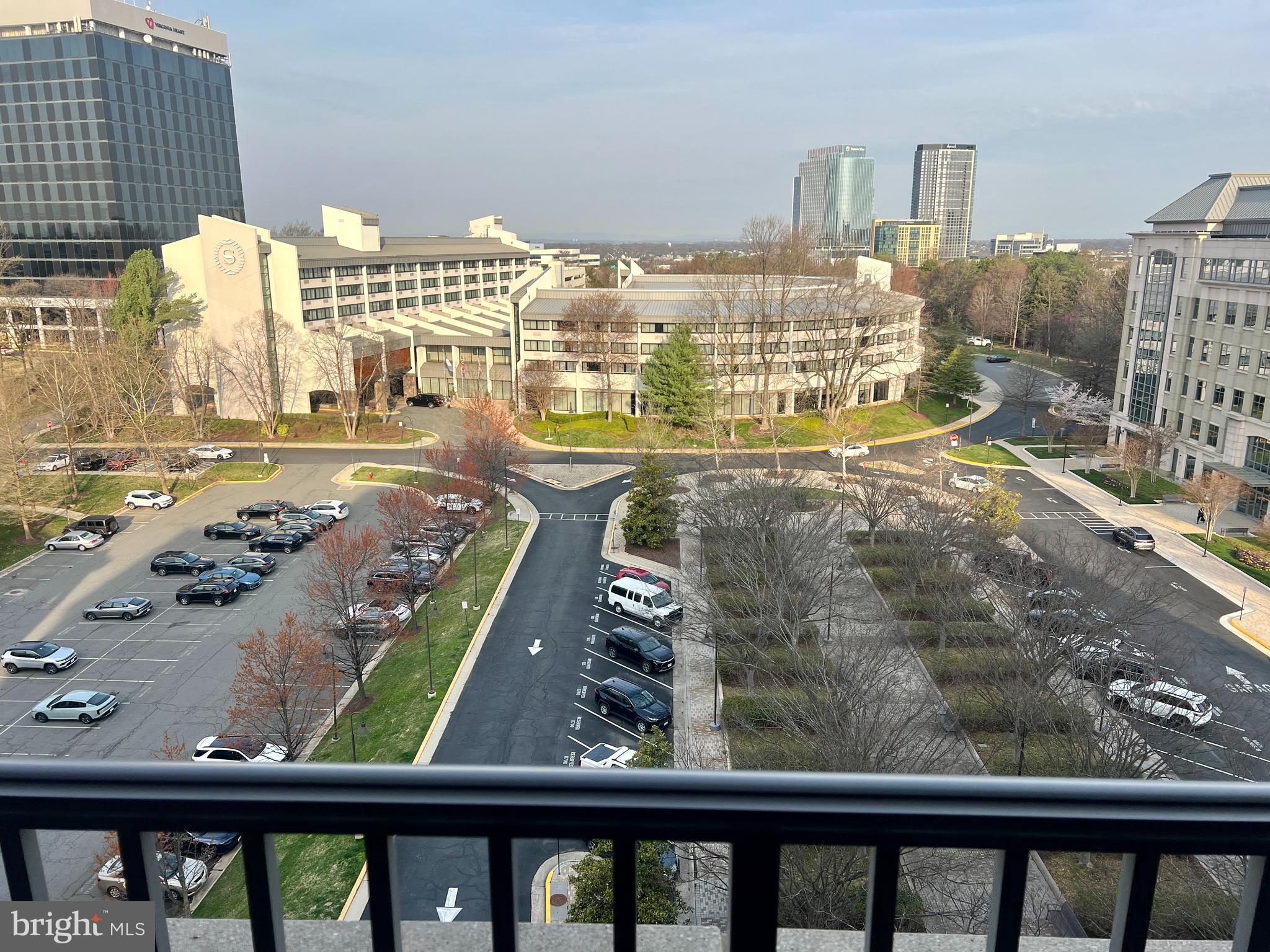 11760 Sunrise Valley Drive, Unit 912 Reston, VA 20191 - Photo 4 of 7 a view of swimming pool from a balcony