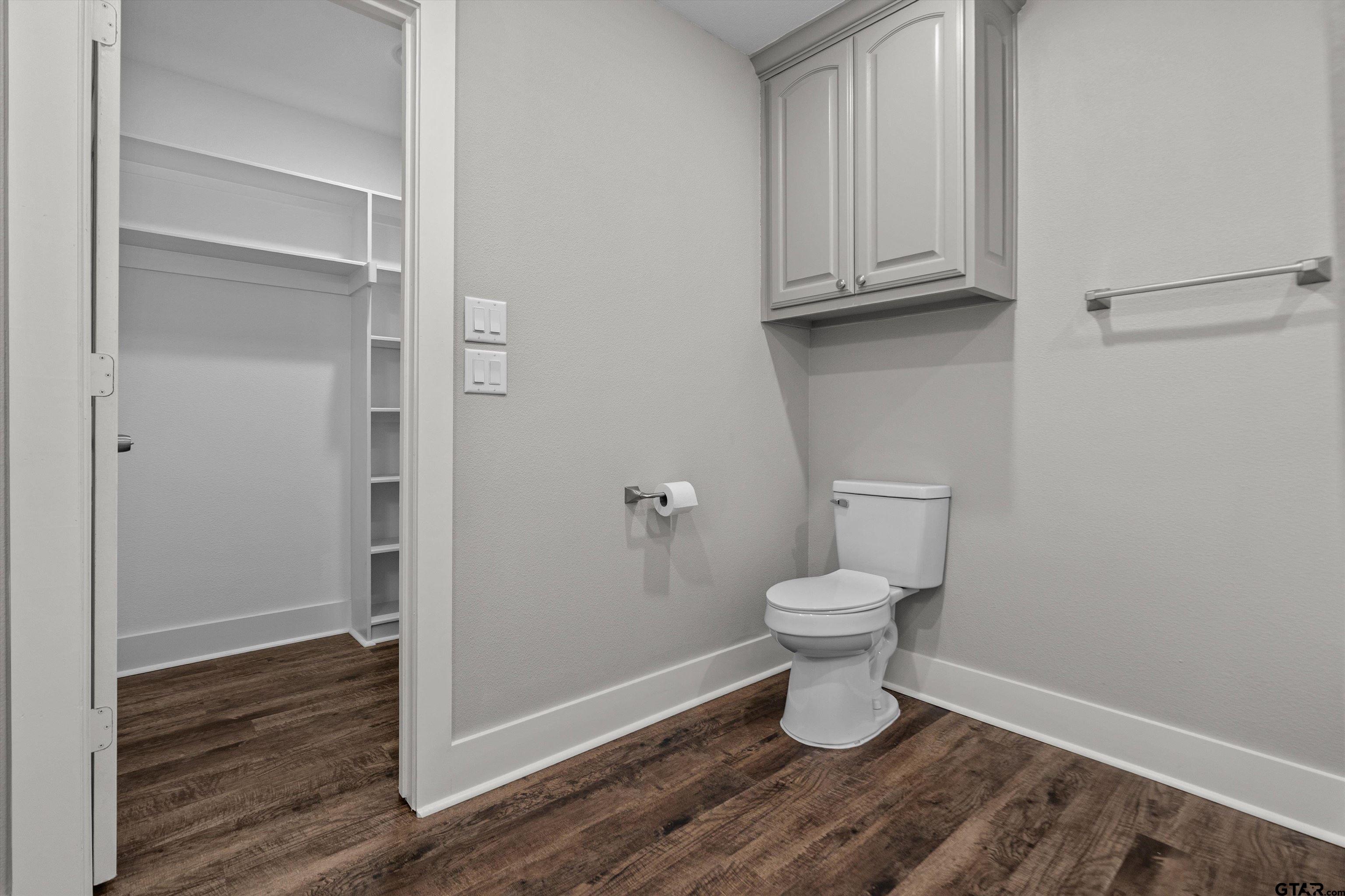 5881 Jefferson Avenue Tyler, TX 75708 - Photo 14 of 20 a bathroom with a toilet