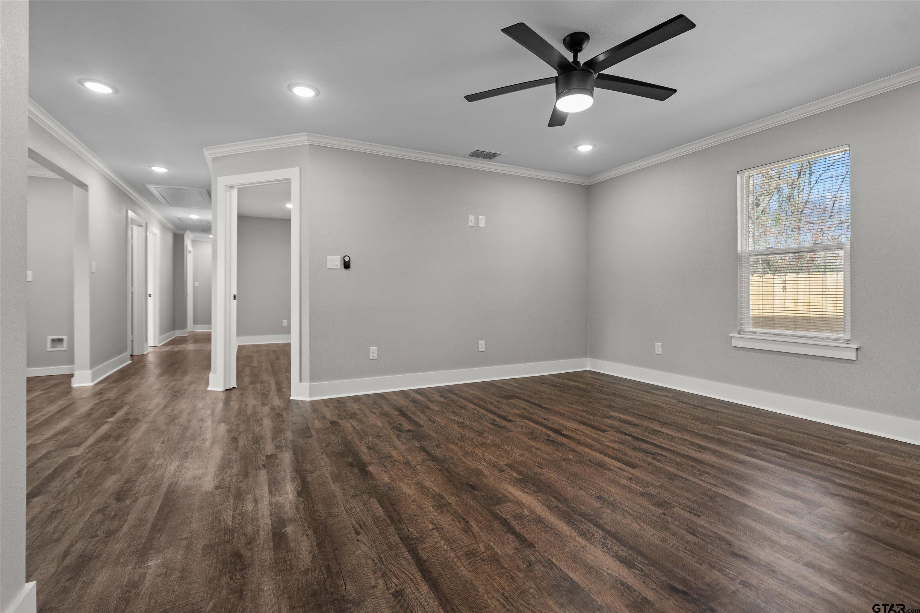 5881 Jefferson Avenue Tyler, TX 75708 - Photo 10 of 20 a view of an empty room with a window