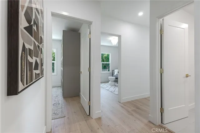 a view of entryway with livingroom and wooden floor