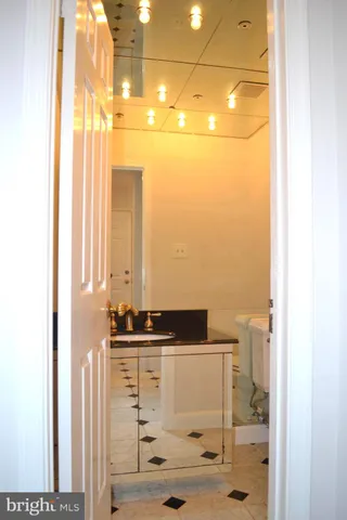a bathroom with a mirror