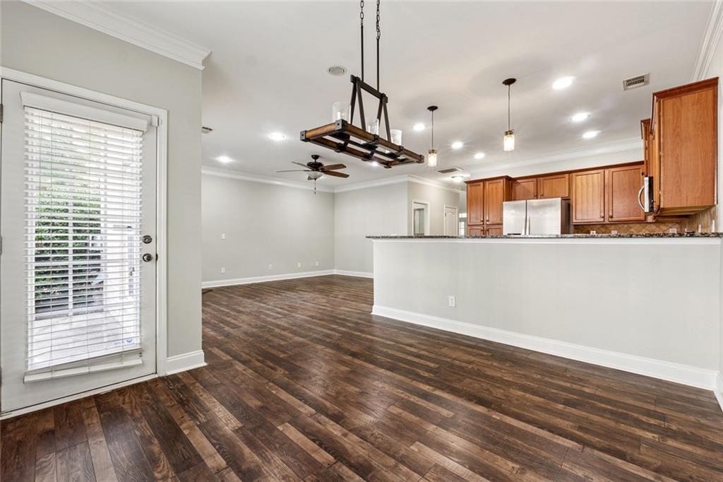 3184 Buck Way Alpharetta, GA 30004 - Photo 16 of 48 a view of a kitchen with a sink and wooden floor