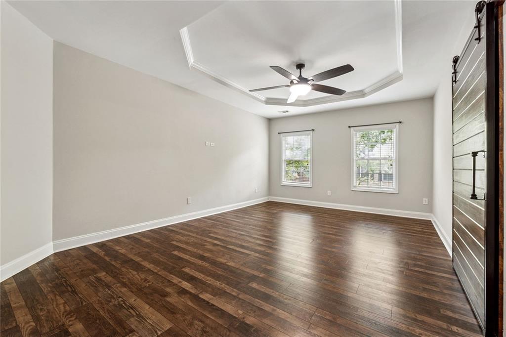 3184 Buck Way Alpharetta, GA 30004 - Photo 18 of 48 wooden floor in an empty room with a window