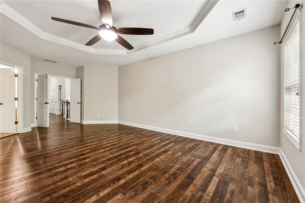 3184 Buck Way Alpharetta, GA 30004 - Photo 21 of 48 wooden floor in an empty room with a window