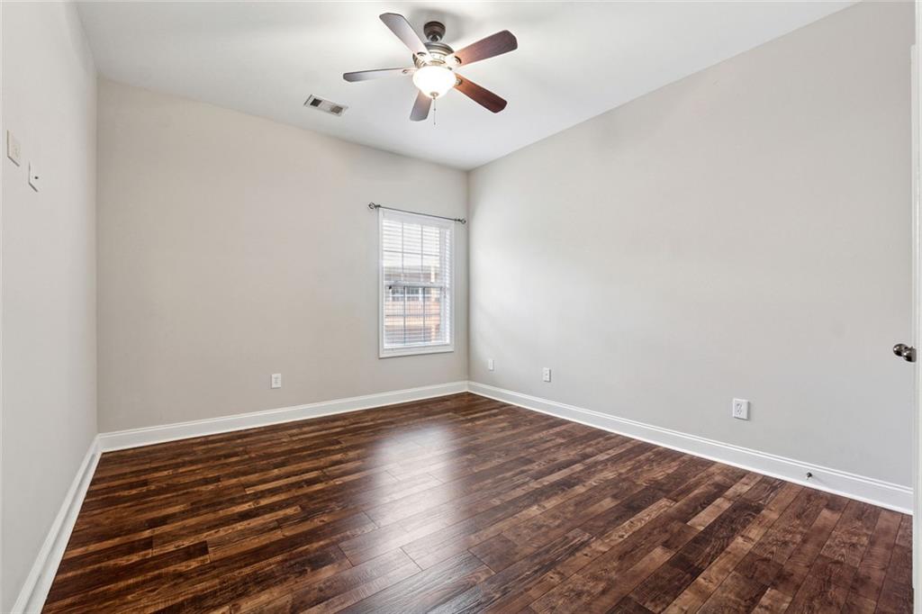3184 Buck Way Alpharetta, GA 30004 - Photo 28 of 48 wooden floor in an empty room with a window