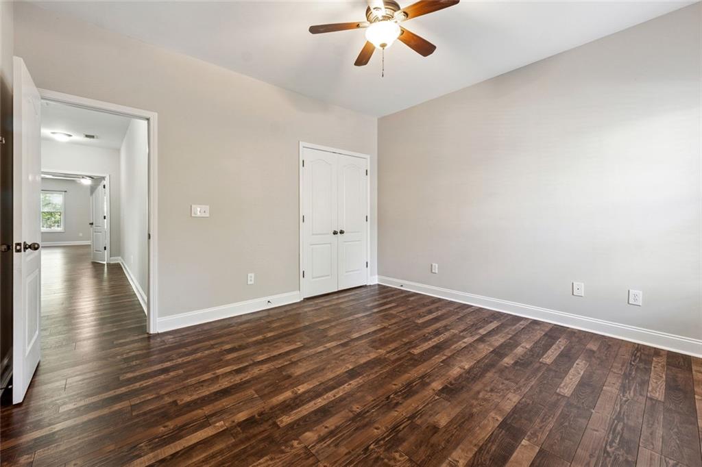 3184 Buck Way Alpharetta, GA 30004 - Photo 31 of 48 wooden floor in an empty room with a window