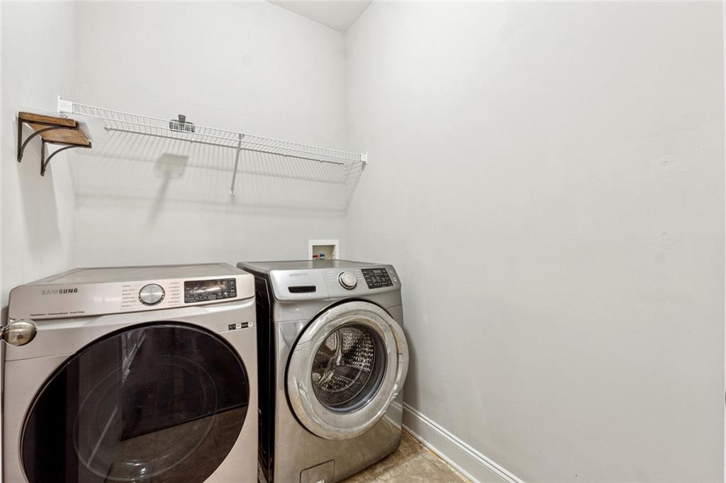 3184 Buck Way Alpharetta, GA 30004 - Photo 36 of 48 a utility room with dryer and washer