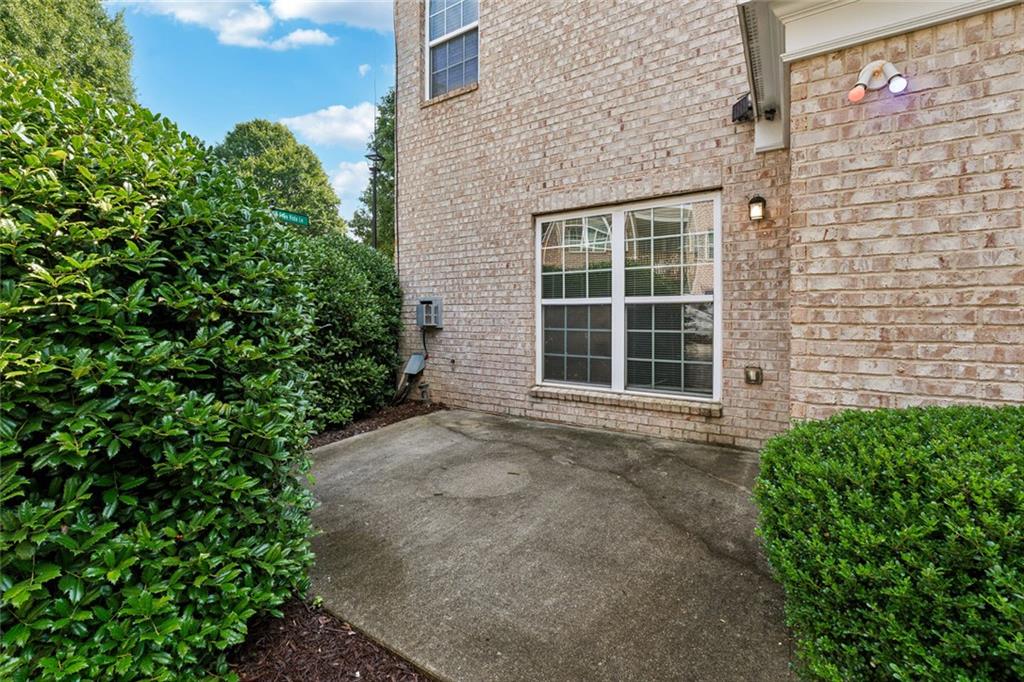 3184 Buck Way Alpharetta, GA 30004 - Photo 38 of 48 a house view with a garden space