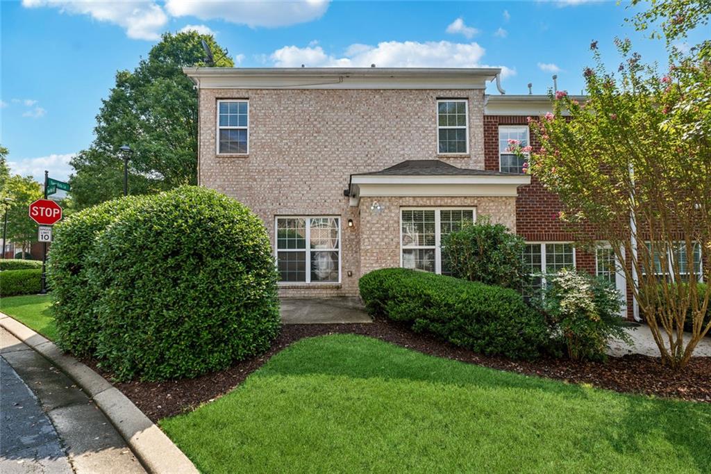 3184 Buck Way Alpharetta, GA 30004 - Photo 39 of 48 front view of a house with a yard