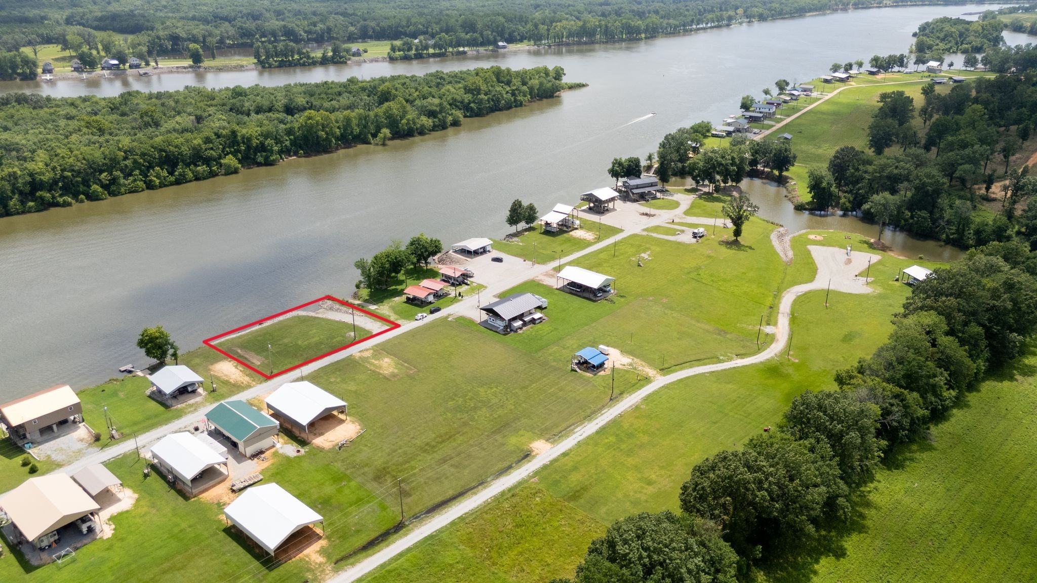 22 WC PICKETT Road Clifton, TN 38425 - Photo 2 of 10 an aerial view of a house with a swimming pool and outdoor seating