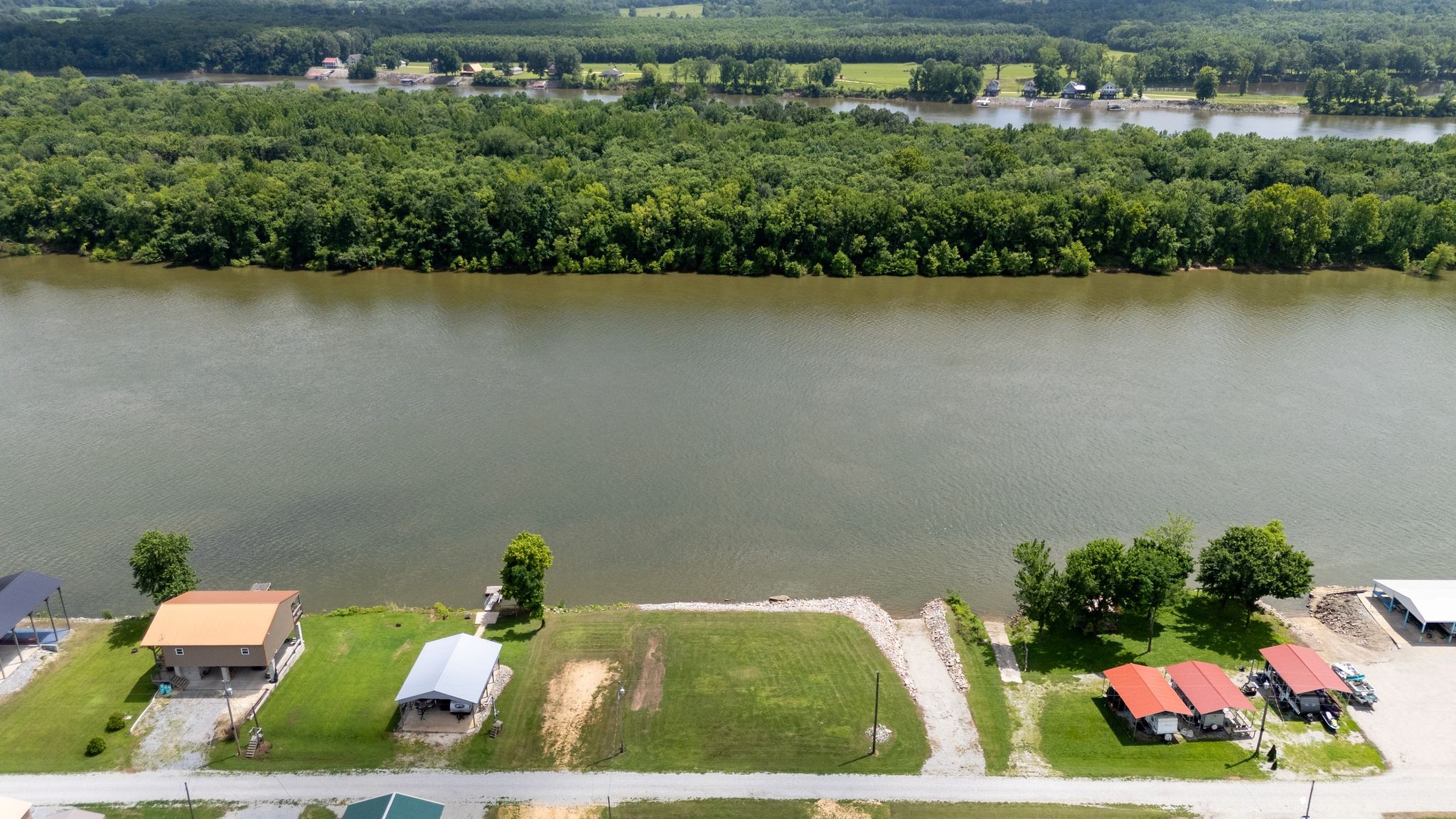 22 WC PICKETT Road Clifton, TN 38425 - Photo 5 of 10 an aerial view of a residential houses with outdoor space and lake view