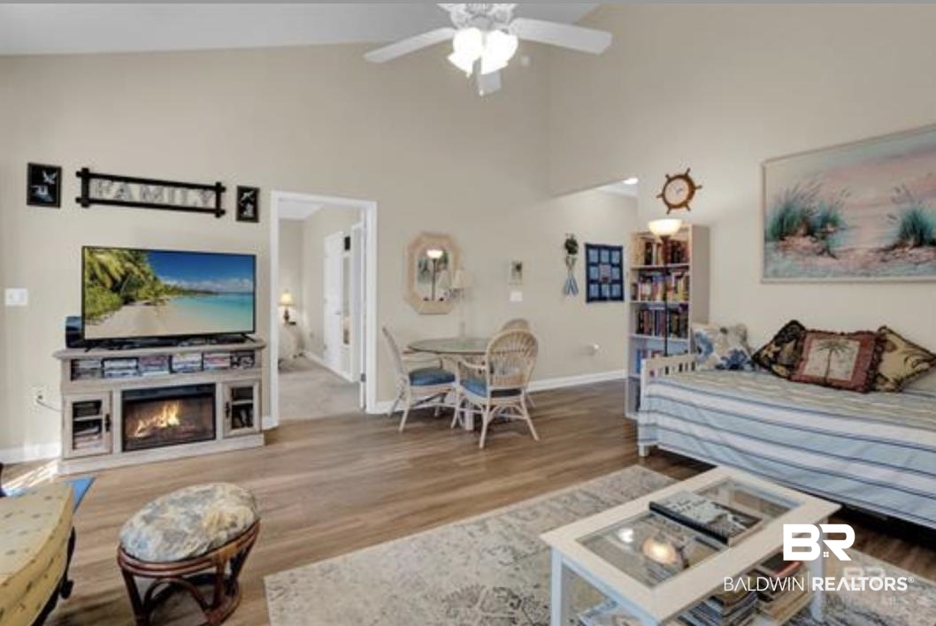 430 West Fort Morgan Road Gulf Shores, AL 36542 - Photo 9 of 27 Vaulted ceilings in the main living area with wood-finish flooring