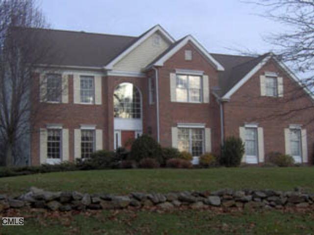 67 Willoughby Road Shelton, CT 06484 - Photo 1 of 1 a front view of a house with a yard and garage