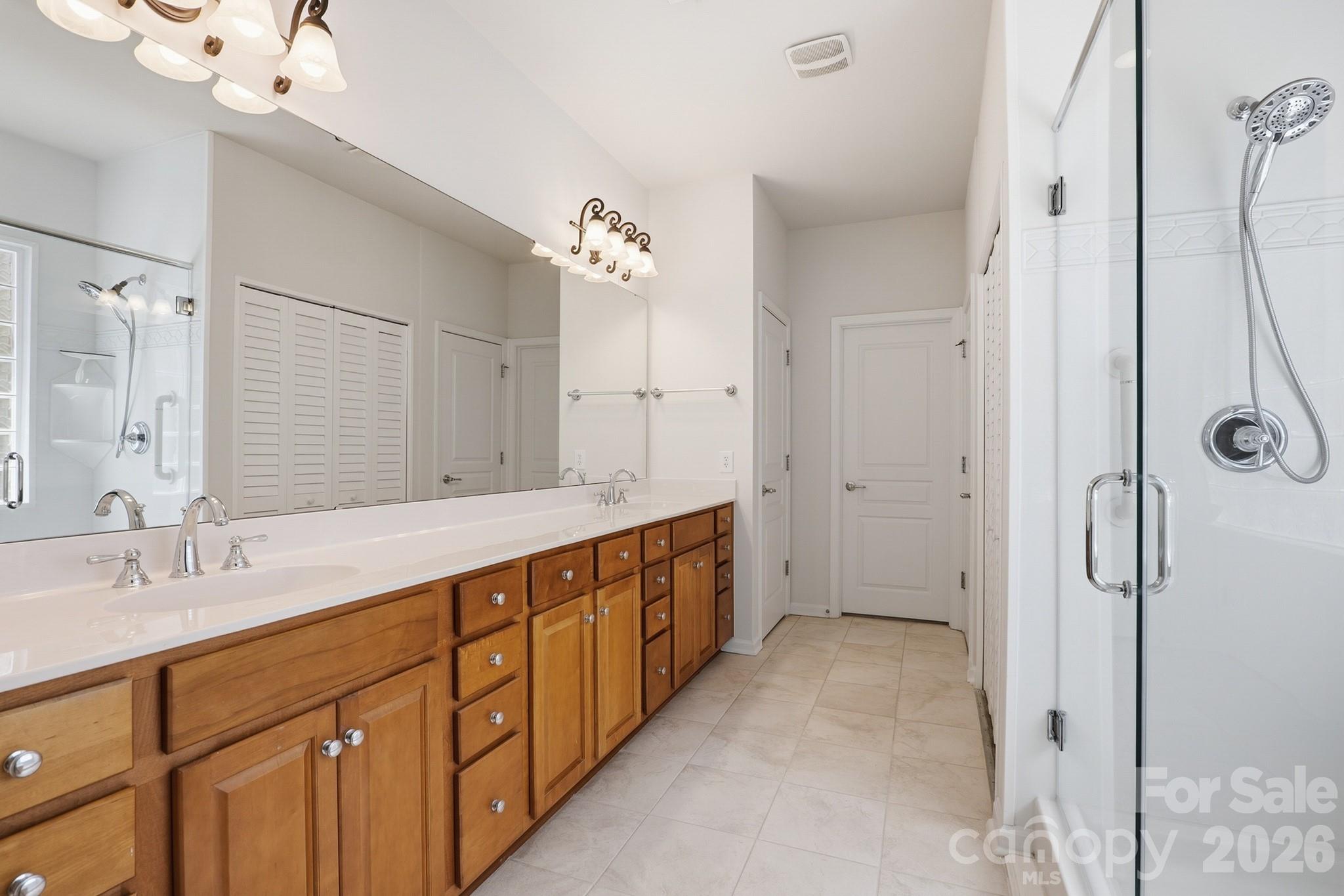 2818 Mandarin Street Fort Mill, SC 29707 - Photo 22 of 48 a spacious bathroom with a double vanity sink mirror and double