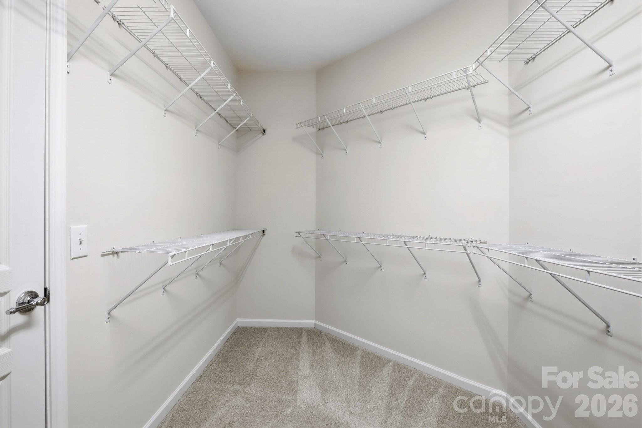 2818 Mandarin Street Fort Mill, SC 29707 - Photo 24 of 48 a view of a room with racks on the wall