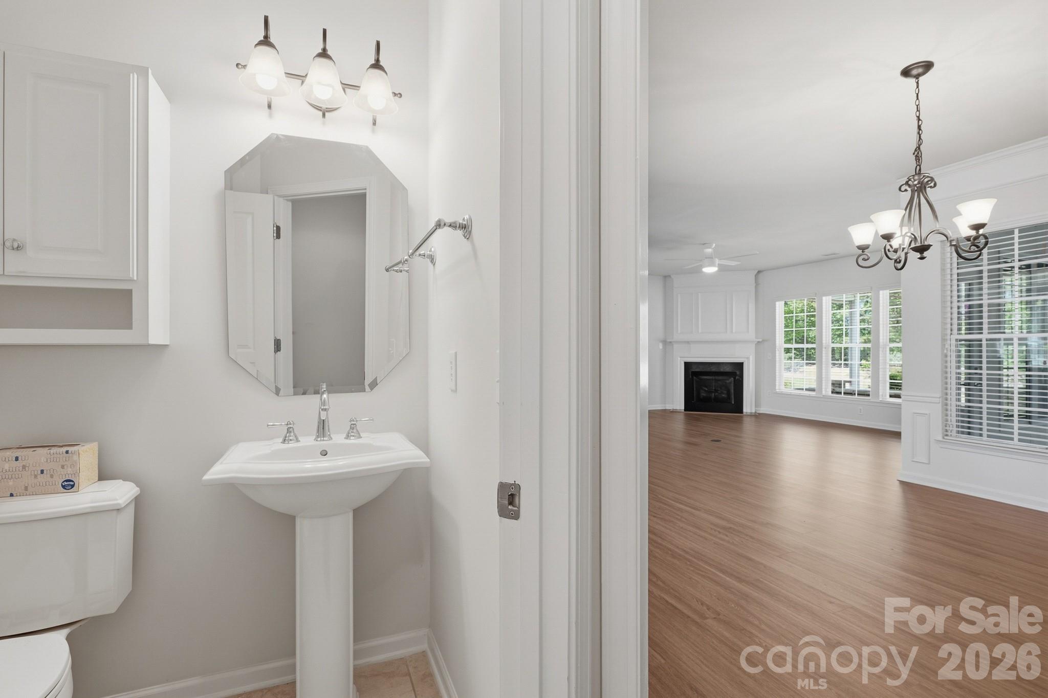 2818 Mandarin Street Fort Mill, SC 29707 - Photo 32 of 48 a bathroom with a sink a mirror and a shower