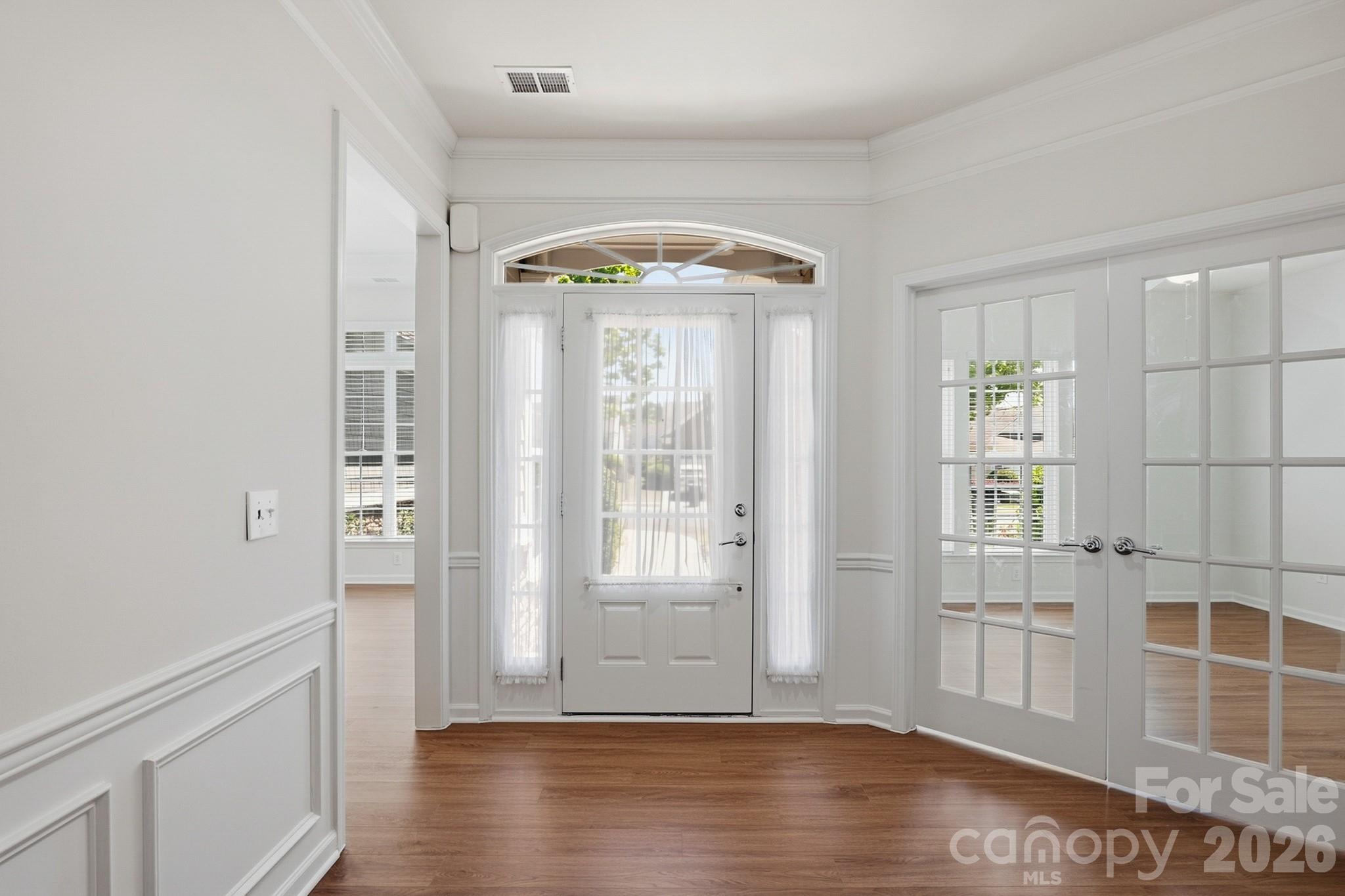 2818 Mandarin Street Fort Mill, SC 29707 - Photo 4 of 48 an empty room with wooden floor and a window