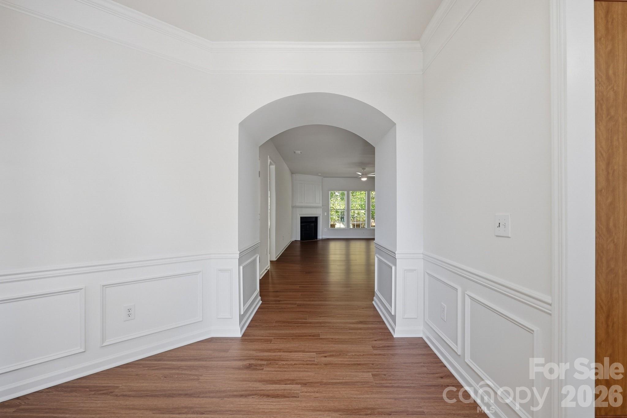 2818 Mandarin Street Fort Mill, SC 29707 - Photo 6 of 48 a view of a hallway with wooden floor and a bathroom