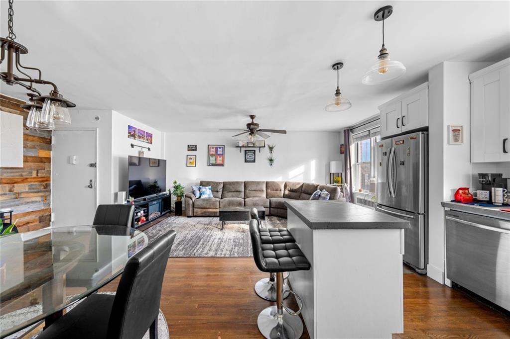 7520 Ridge Boulevard, Unit 2A Brooklyn, NY 11209 - Photo 8 of 15 a kitchen with sink refrigerator and stove