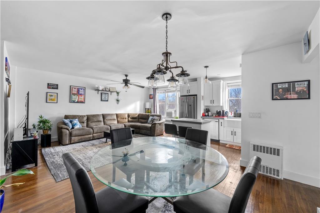 7520 Ridge Boulevard, Unit 2A Brooklyn, NY 11209 - Photo 9 of 15 a view of a dining room with furniture and wooden floor