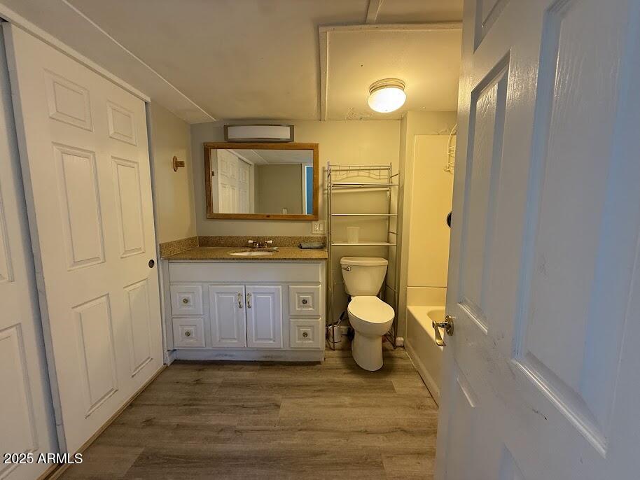 17601 North 22nd Place Phoenix, AZ 85022 - Photo 14 of 23 a bathroom with a granite countertop toilet sink and mirror