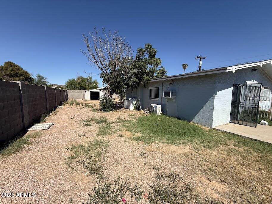 17601 North 22nd Place Phoenix, AZ 85022 - Photo 7 of 23 a view of a house with a backyard