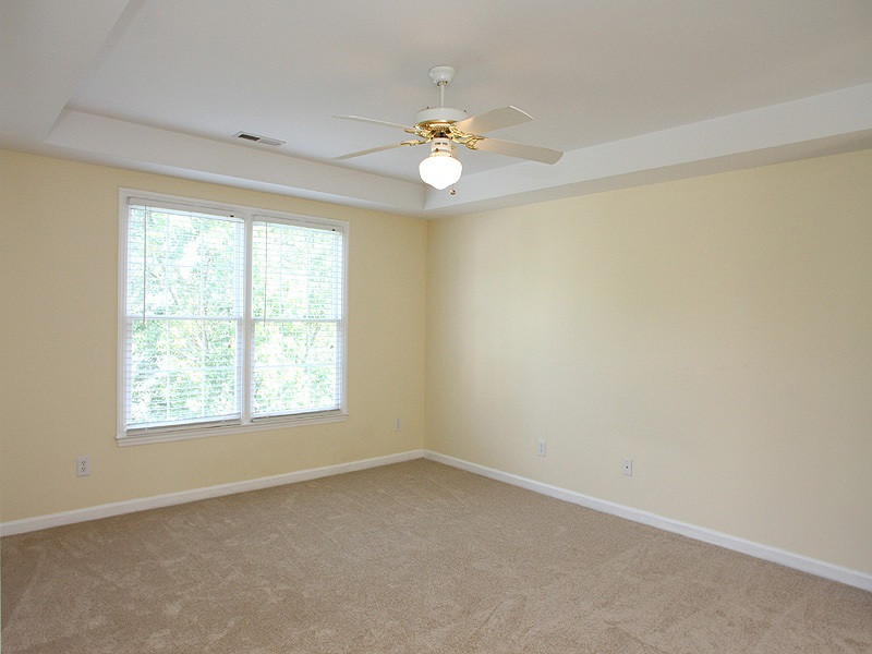 2305 Kendricks Court Raleigh, NC 27613 - Photo 10 of 23 Spacious master has trey ceiling, ceiling fan, new carpet, large WIC. Master Bedroom
