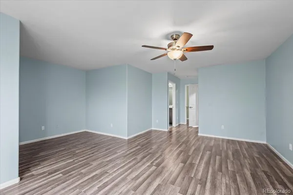 a bathroom with a sink double vanity granite tub and a mirror